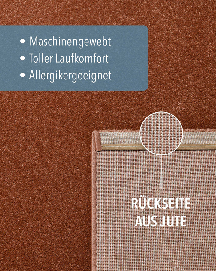 Kurzflor Teppich Montepulciano Ziegel Rot Detailaufnahme der Rückseite aus Jute und Materialstruktur