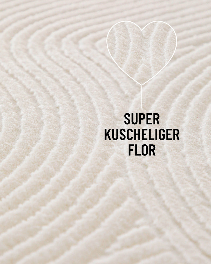 Nahaufnahme Nuuk Arc Kurzflorteppich creme-weiß mit Detailausschnitt vom kuscheligen Flor