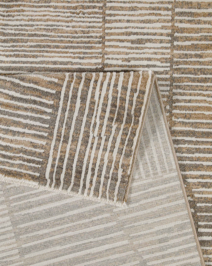 Kurzflor Teppich Raymond in Beige Grau Detailaufnahme der Teppichkante und hochwertigen Verarbeitung