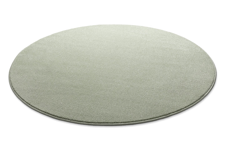Kurzflor Teppich Freja Licht Grün rund flach ausgelegt, zeigt Form und niedrige Florhöhe