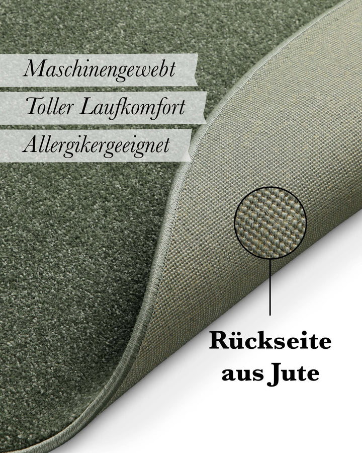 Kurzflor Teppich Freja Laub Grün rund Detail der Rückseite mit Hinweis auf Jute-Träger und Materialaufbau