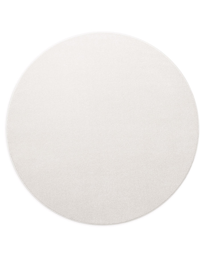 Kurzflor Teppich Montepulciano Creme Weiß rund freigestellt, gleichmäßige Farbstruktur sichtbar