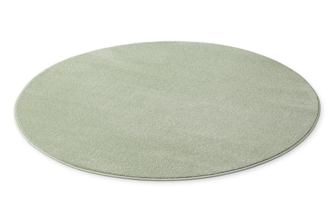 Kurzflor Teppich Vegas Hellgrün rund, flache Perspektive zeigt Kreisform auf hellem Hintergrund