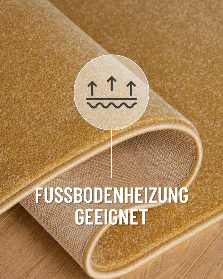 Kurzflor Teppich Vegas Ocker Gelb Detail mit Symbol für Fußbodenheizung geeignet