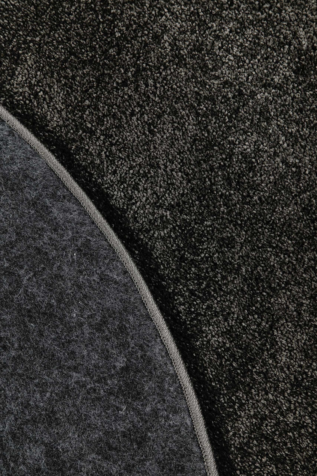 Manta Teppich anthrazit Hochflor rund