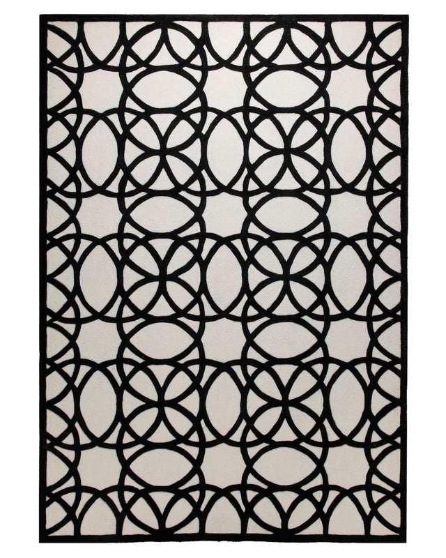 Schwarz auf Weiß - Handtuft mit Kreisornament 160 x 230 cm – Produktfoto freigestellt