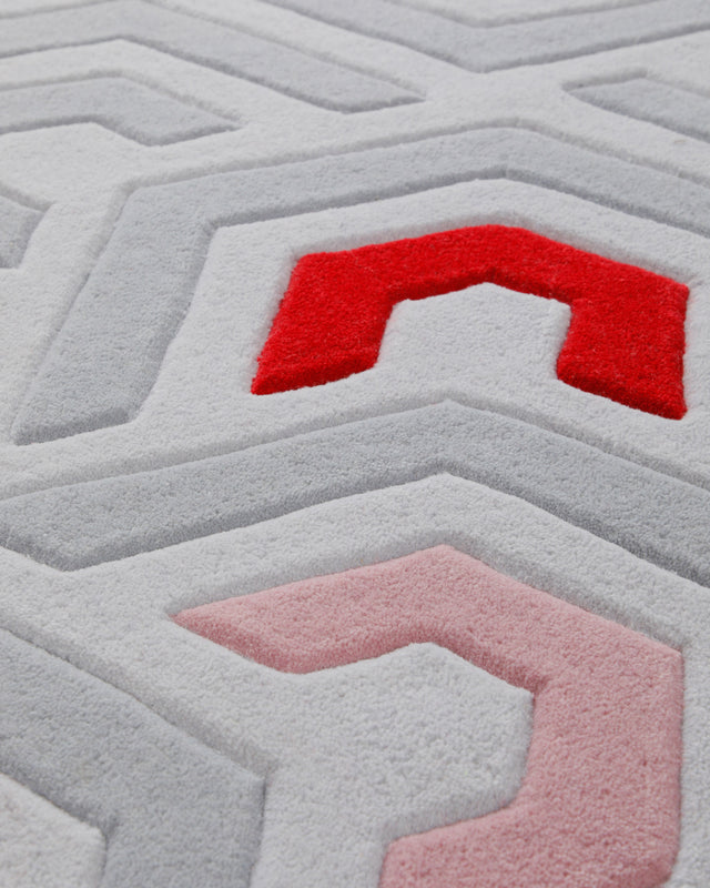 Labyrinth in Sand mit Rot - Hoch-Tief-Handtuft 160 x 230 cm – Detailaufnahme der Hoch-Tief-Struktur