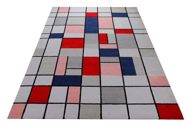 Farbraster in Rot und Grau - Handtuft Wolle 160 x 230 cm – Teppich im Raum platziert