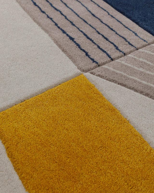 Ocker über Navy - Handtuft 160 x 230 cm – Detailaufnahme der Textur