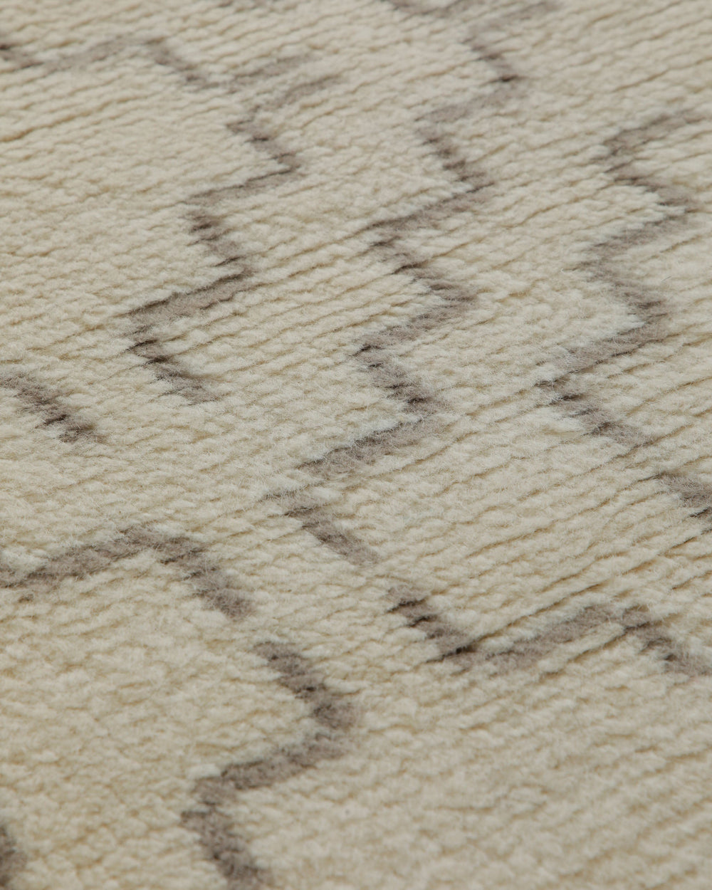Summer Hochflor Handknüpfteppich Wolle naturweiß 160x230 cm – Close-up der Webart