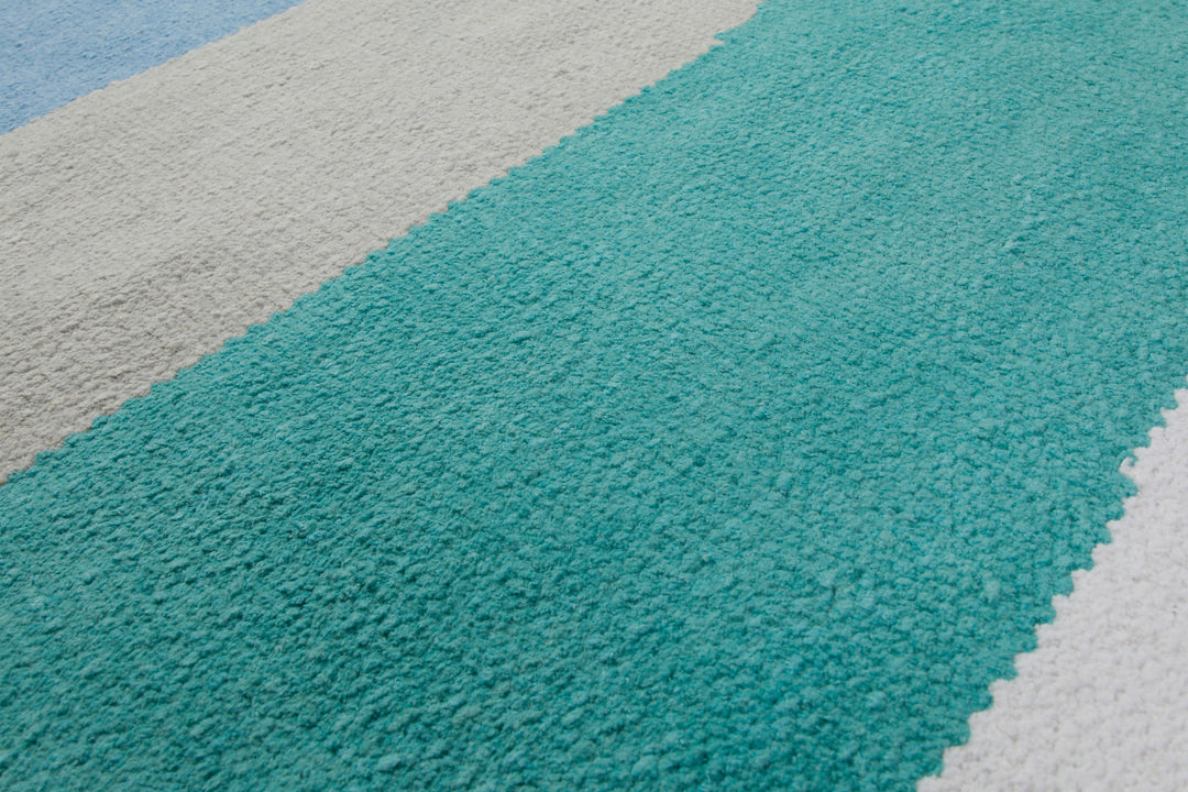 160x230 Teppich Wohnzimmer Aquawellen in Türkis und Hellblau – Skandi-Streifenteppich mit fließenden Bändern