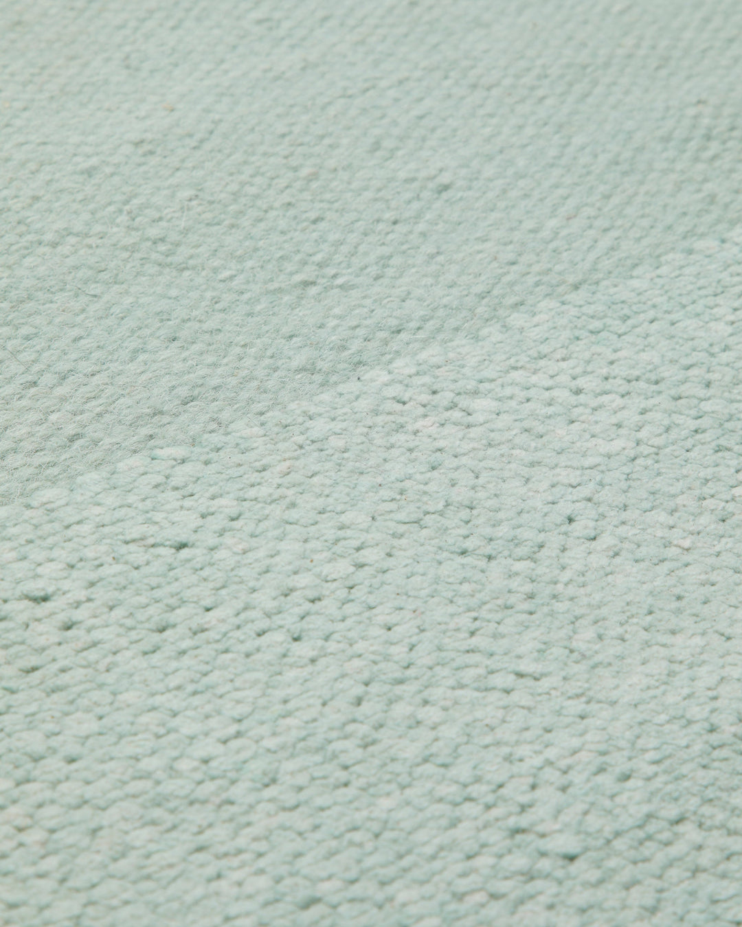 Spring Handwebteppich Chenille uni mint 160x230 cm – Nahaufnahme von Struktur und Textur