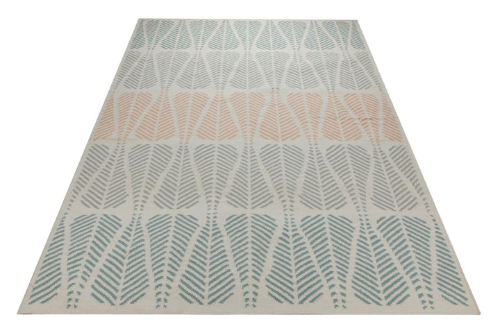 Handwebteppich Wolle Blattmuster petrol lachs 160x230 cm – Lifestyle-Aufnahme im Interieur