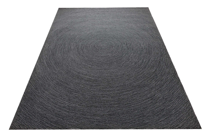 Kreiswirbel in Anthrazit - Handtuft Wolle 160 x 230 cm – Teppich im Raum platziert