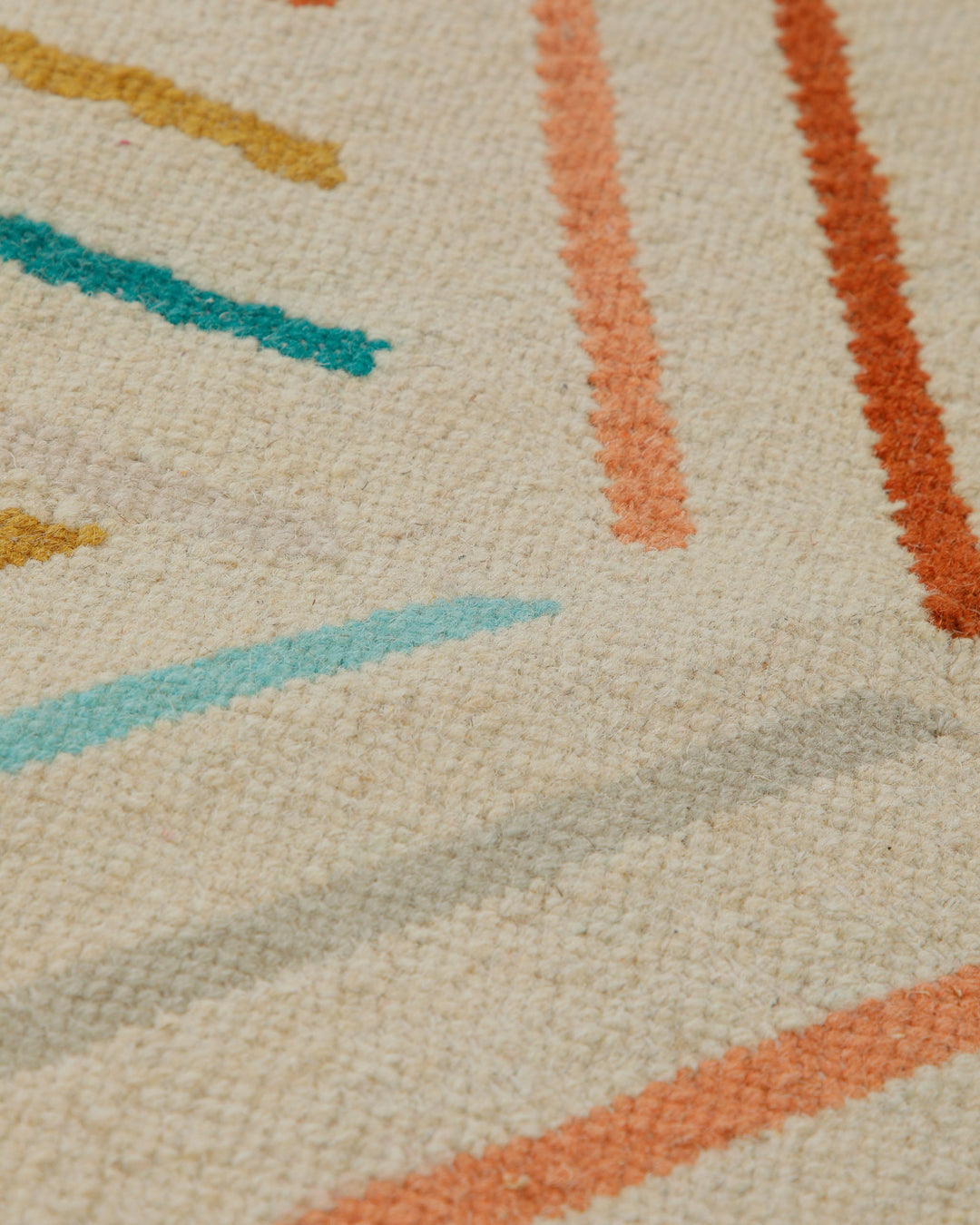 Handwebteppich Wolle Diagonallinien bunt creme 160x230 cm – Nahaufnahme von Struktur und Textur