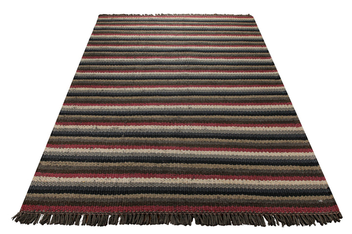 Dedon Outdoor Handwebteppich rot grau gestreift 160x230 cm – Lifestyle-Aufnahme im Interieur