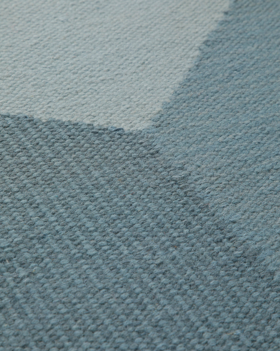 Handwebteppich Wolle Rautenmuster blaugrau 160x230 cm – Detailaufnahme der Musterung