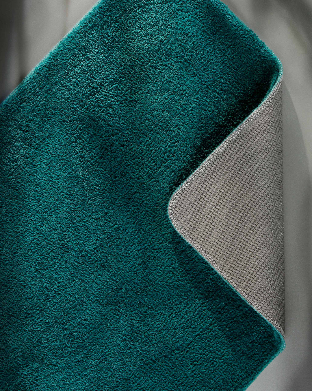 Badematte Badteppich Joris Petrol flauschig Detailbild umgeklappt